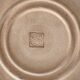Round glazed earthenware dish by Biot, 20th century, stylized decoration