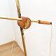 Floor lamp with a swivelling arm