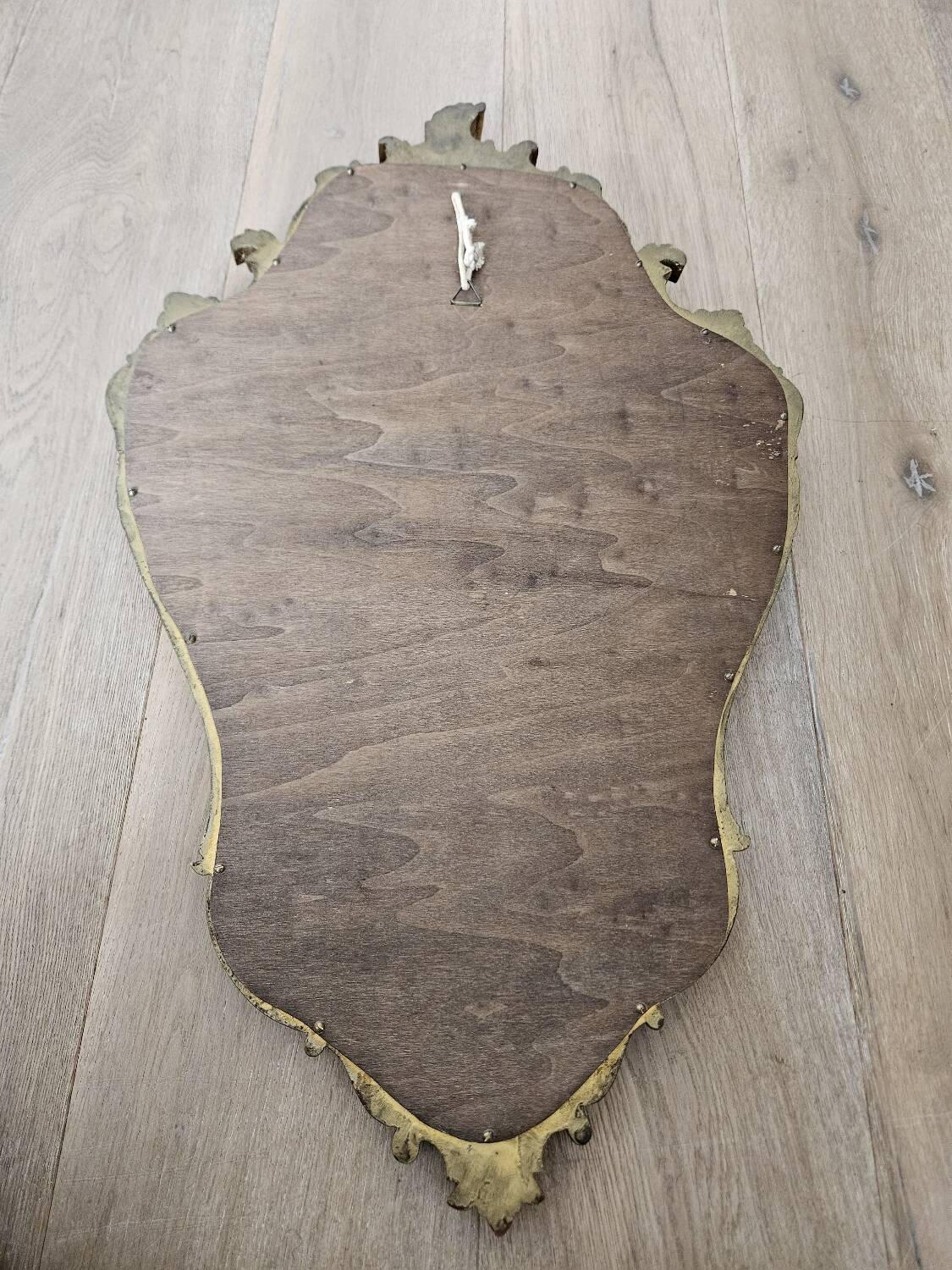 Rockery mirror under gilded frame