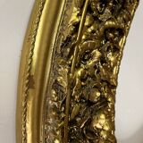 Large format golden oval frame