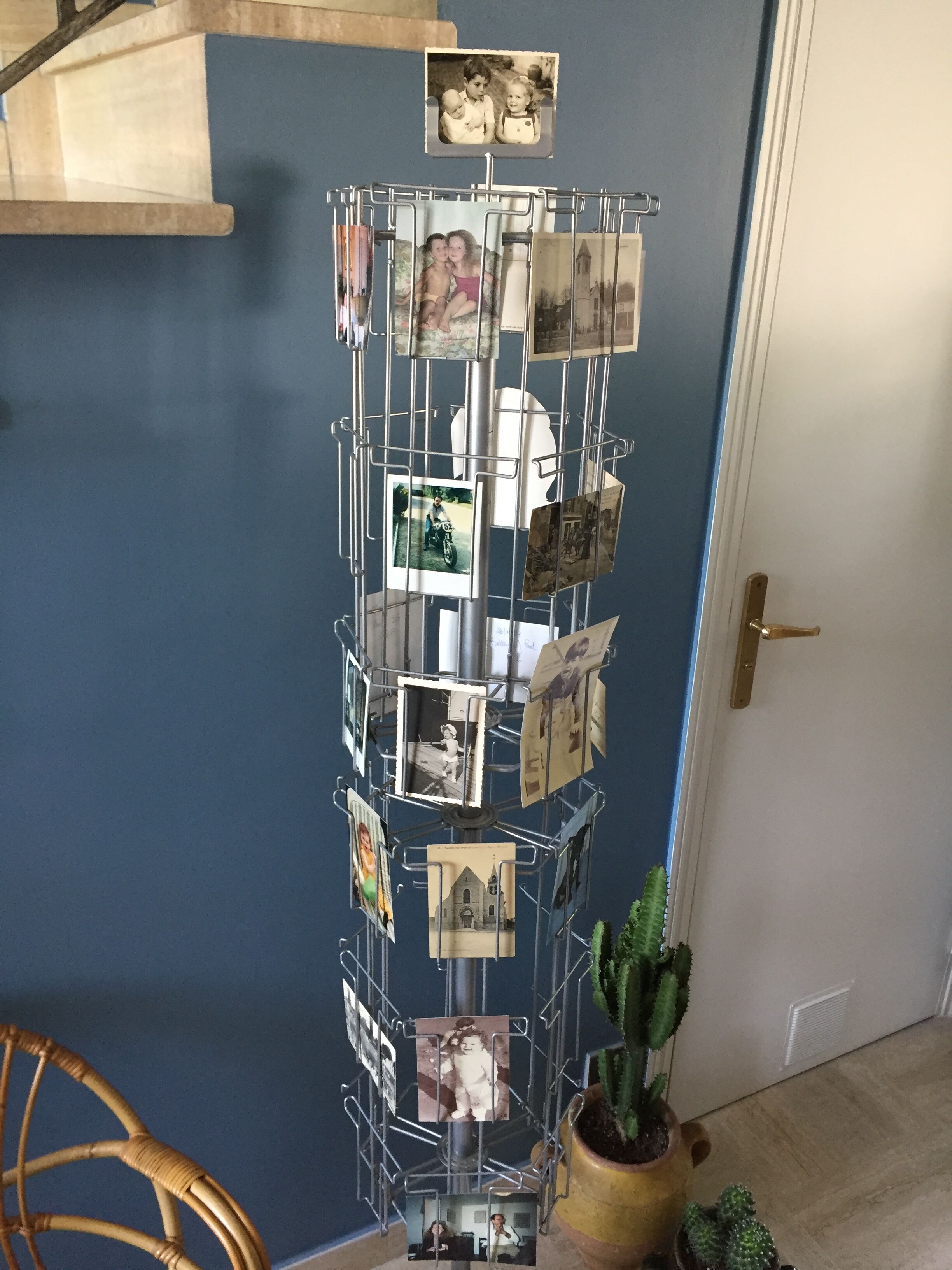 Display postcards and photos in gray metal double turnstile