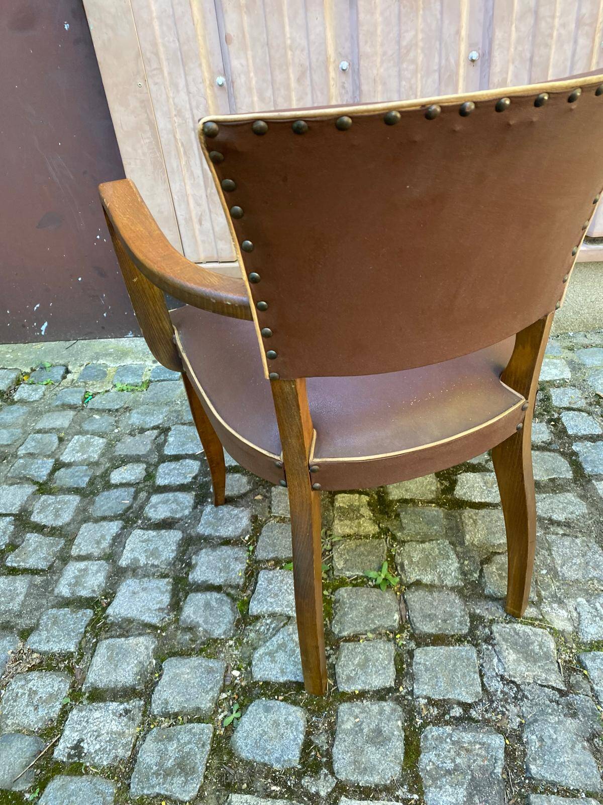 Art Deco bridge armchairs in leather from the 1950s.