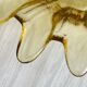 Yellow translucent blown glass pocket emptier
