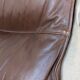 Leather and wood armchair, brutalist style.
