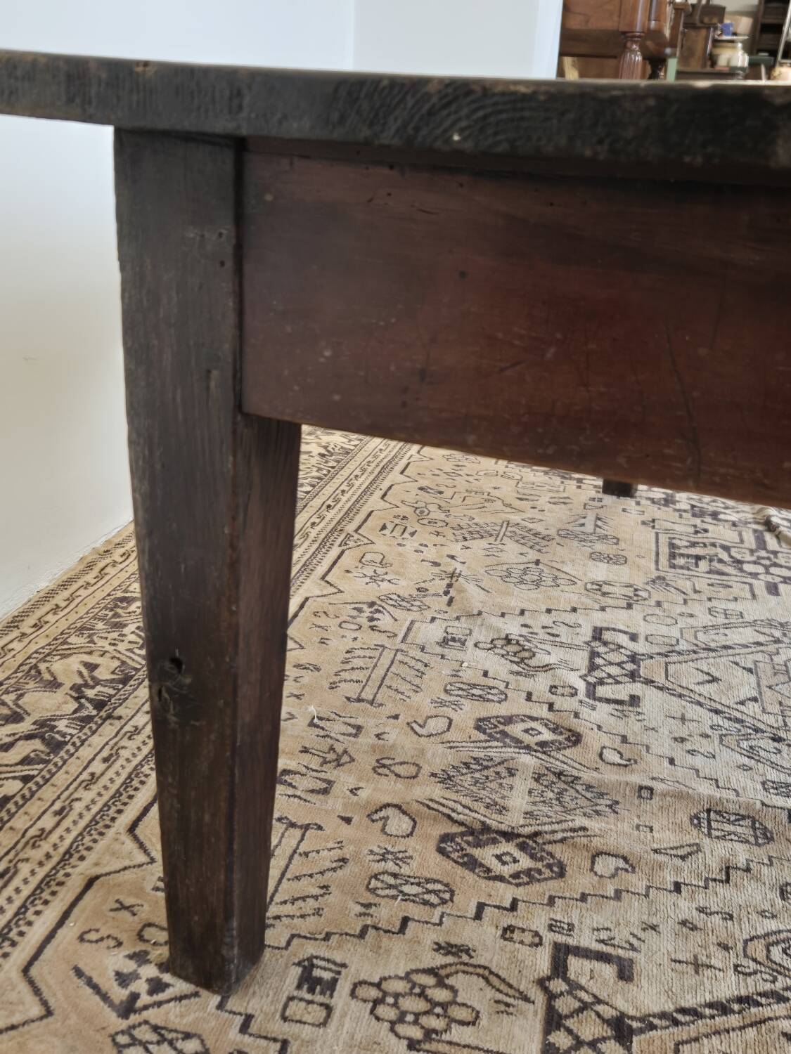 Rustic farmhouse coffee table from the 1900s with two drawers.