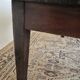 Rustic farmhouse coffee table from the 1900s with two drawers.
