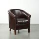 Dark cow leather club armchair in good condition with an English design