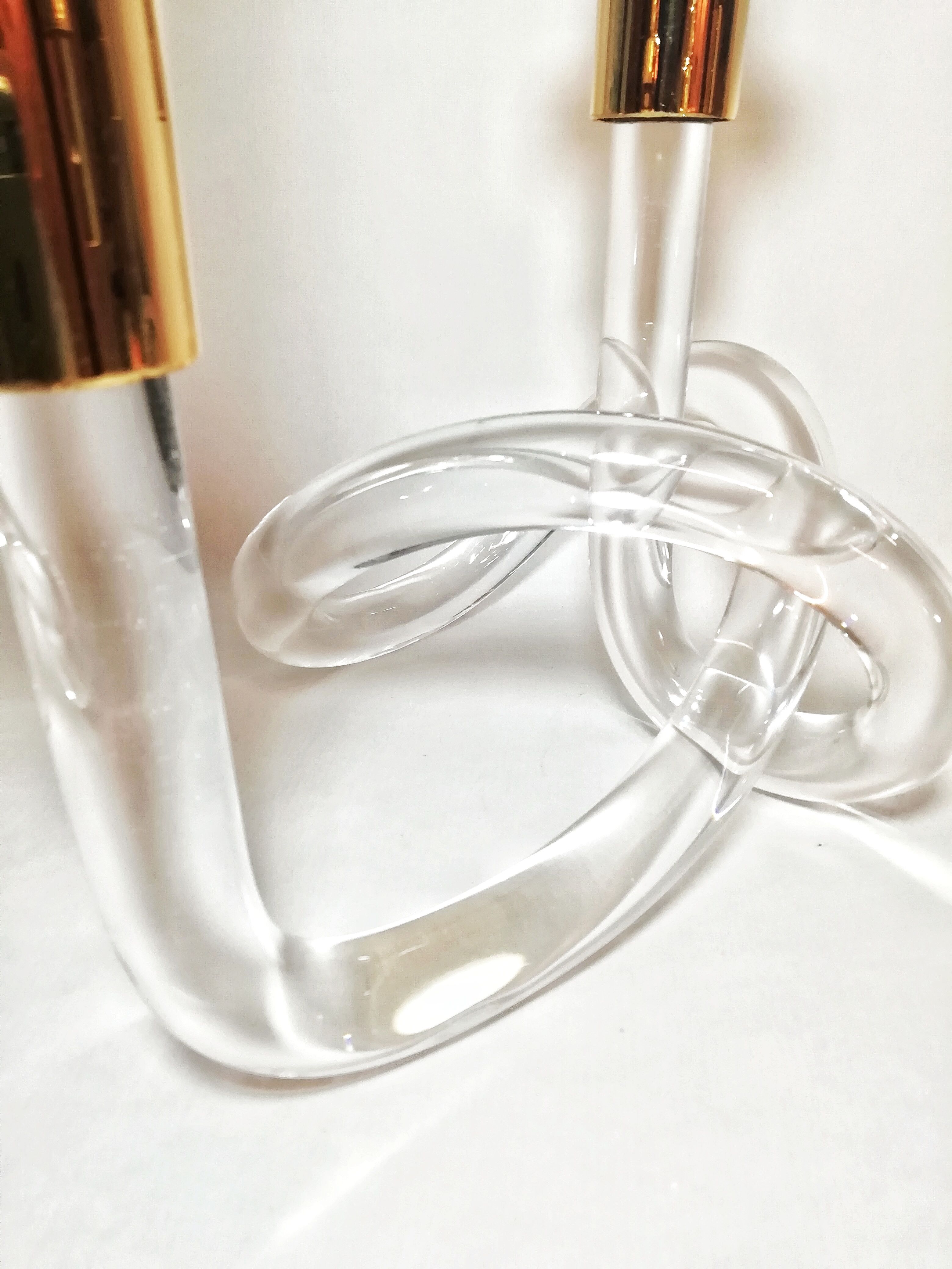 Pair of Dorothy Thorpe's pretzel chandeliers