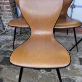 4 vintage chairs in skaï and metal base from the 60s