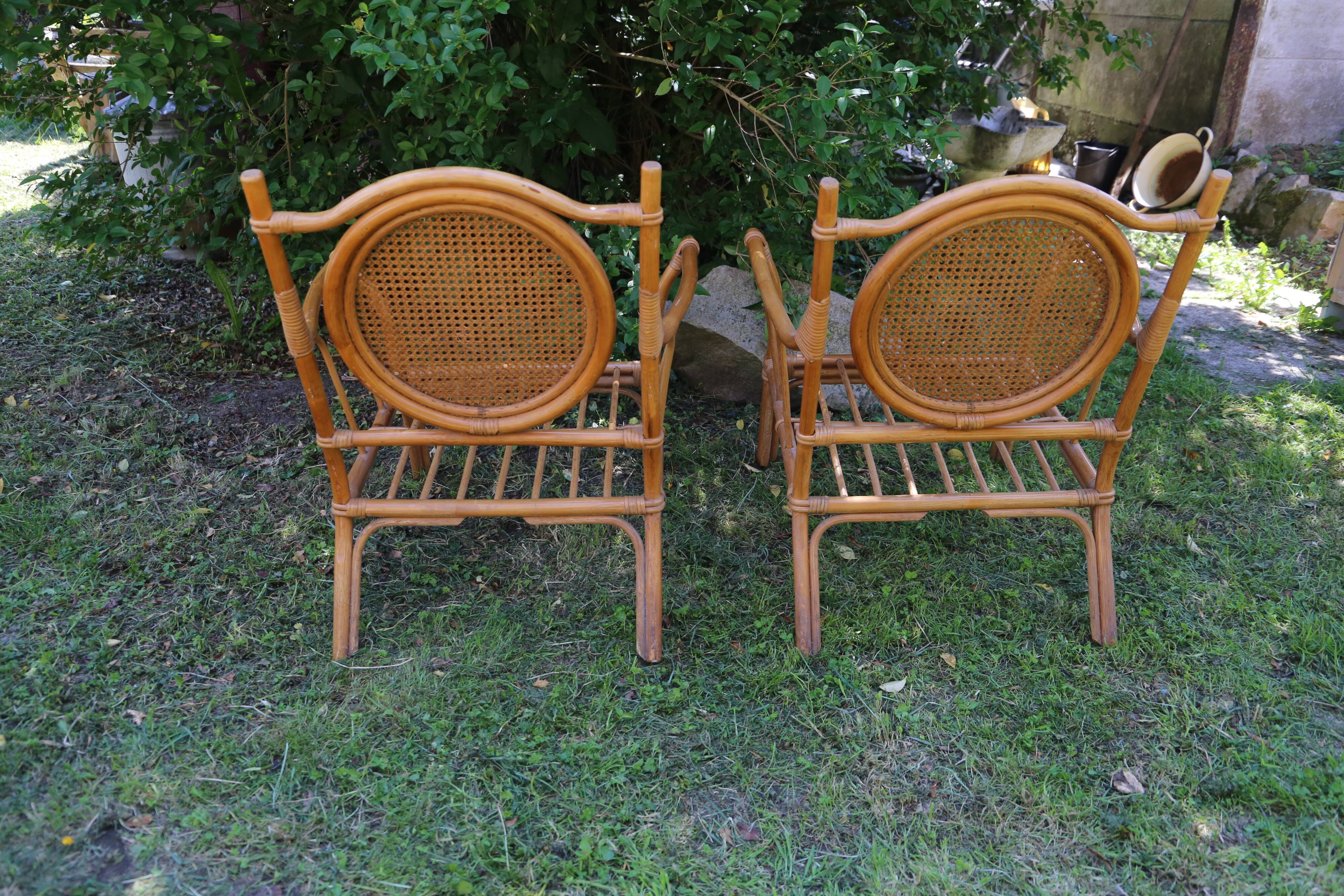 Duo of vintage rattan armchairs