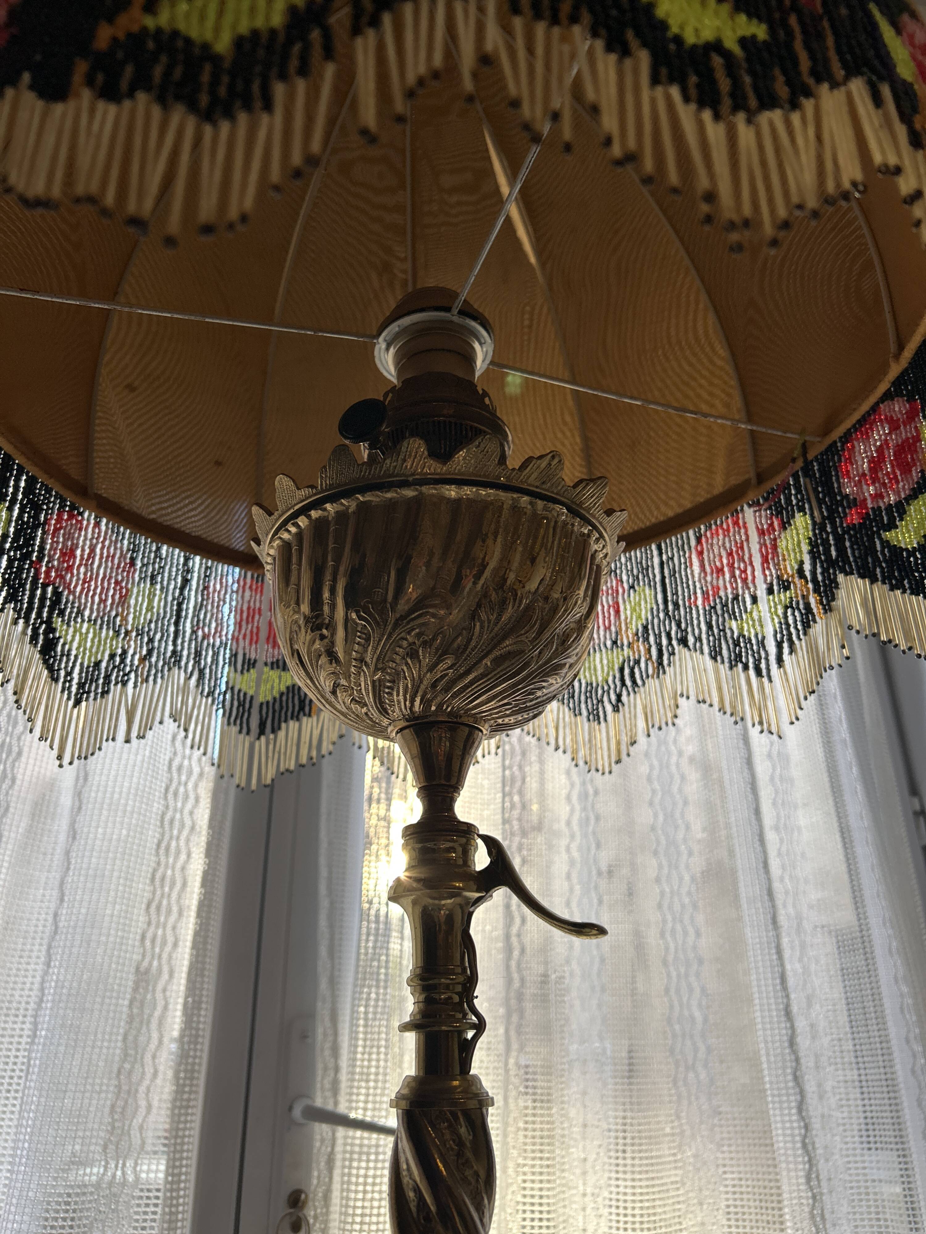 Living room floor lamp in bronze and white marble.