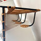 Iron and rattan coat rack by Jacques Adnet, 1960s.
