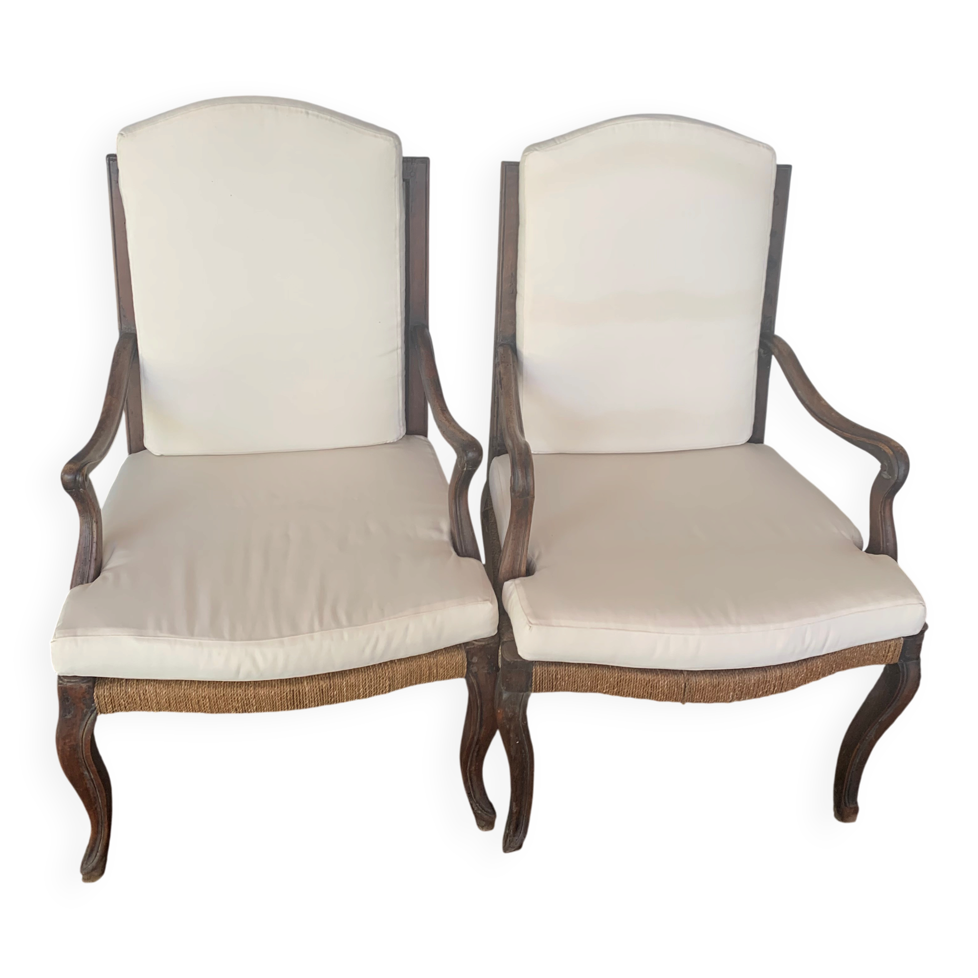Pair of Louis XV style armchairs in walnut with rush seating.