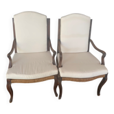 Pair of Louis XV style armchairs in walnut with rush seating.