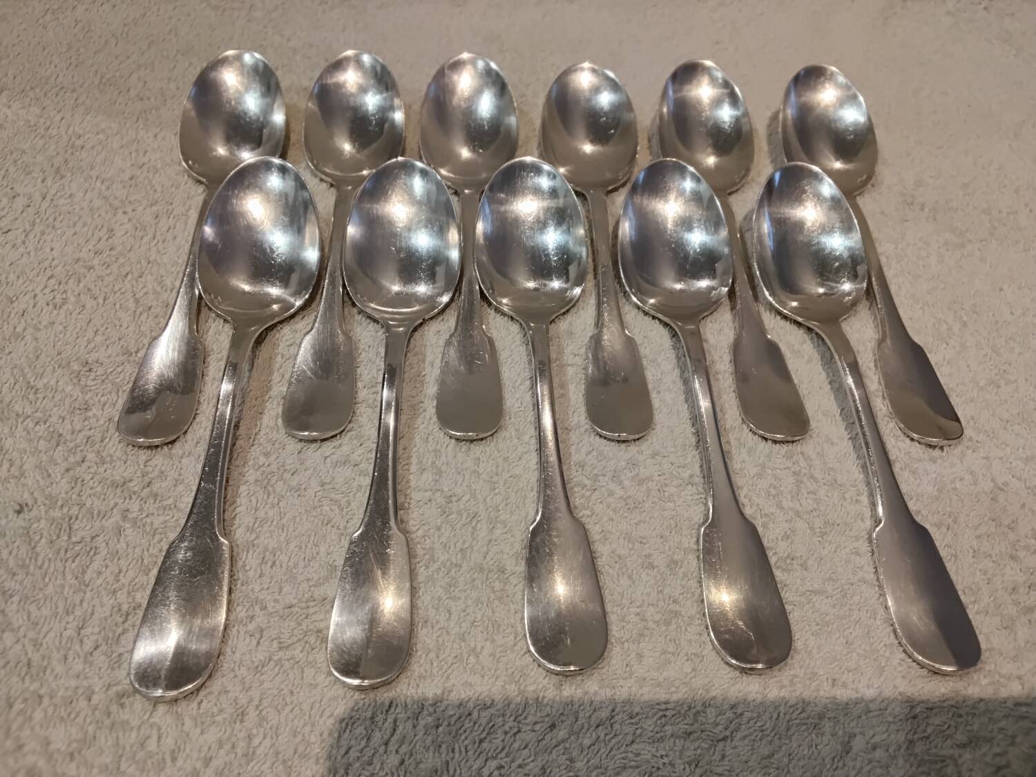 11 silver-plated dessert spoons by Christofle, Cluny pattern, striped