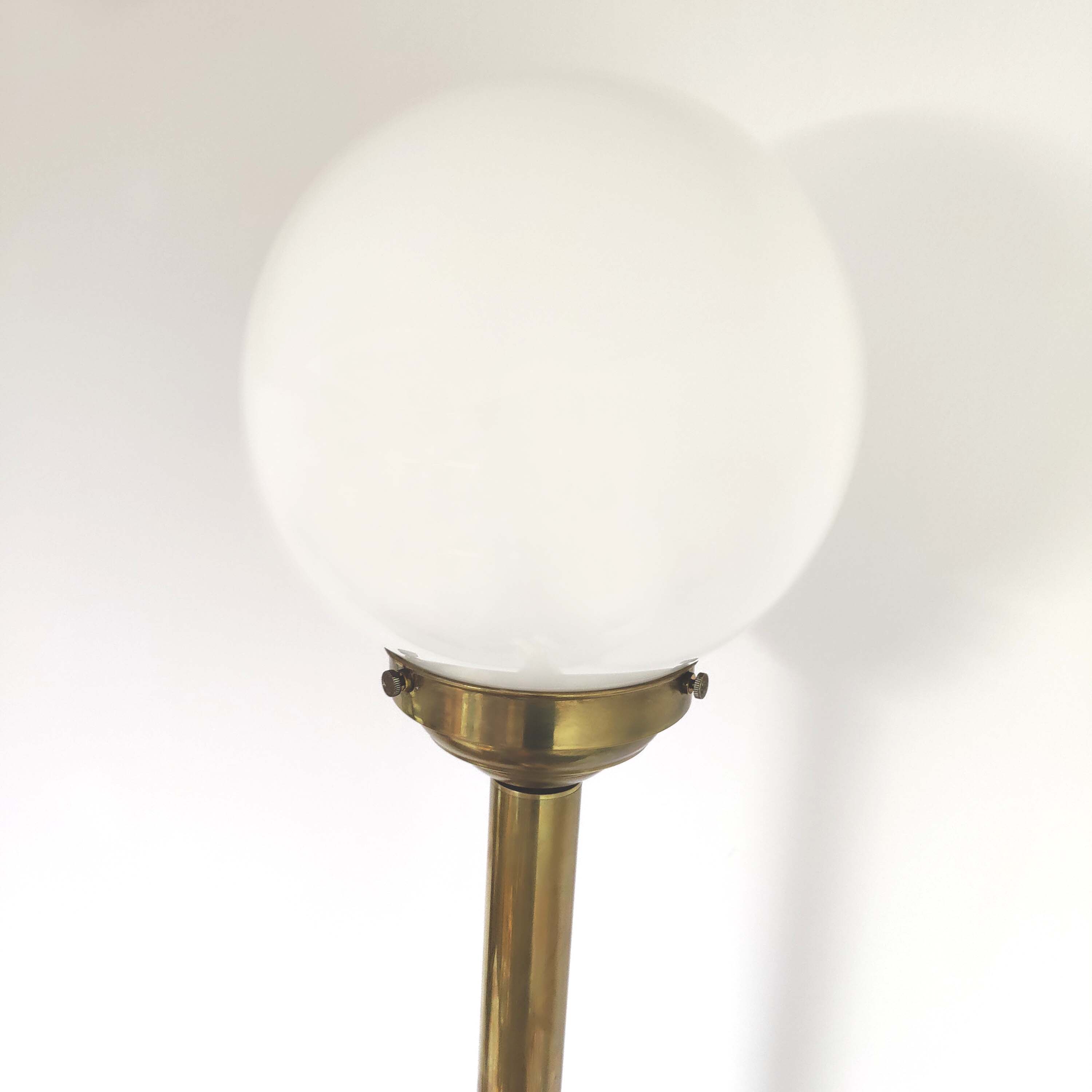 Brass brasserie floor lamp with opaline glass globe
