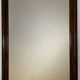 Grand miroir mural en bois mouluré
