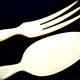 Salad serving set in antique ivory, silver-plated handle.