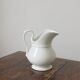 Antique white porcelain jug from the 19th century
