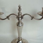 Two-branch silver-plated candle holder from the early twentieth century.