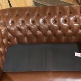 brown leather 2-seater Chesterfield sofa
