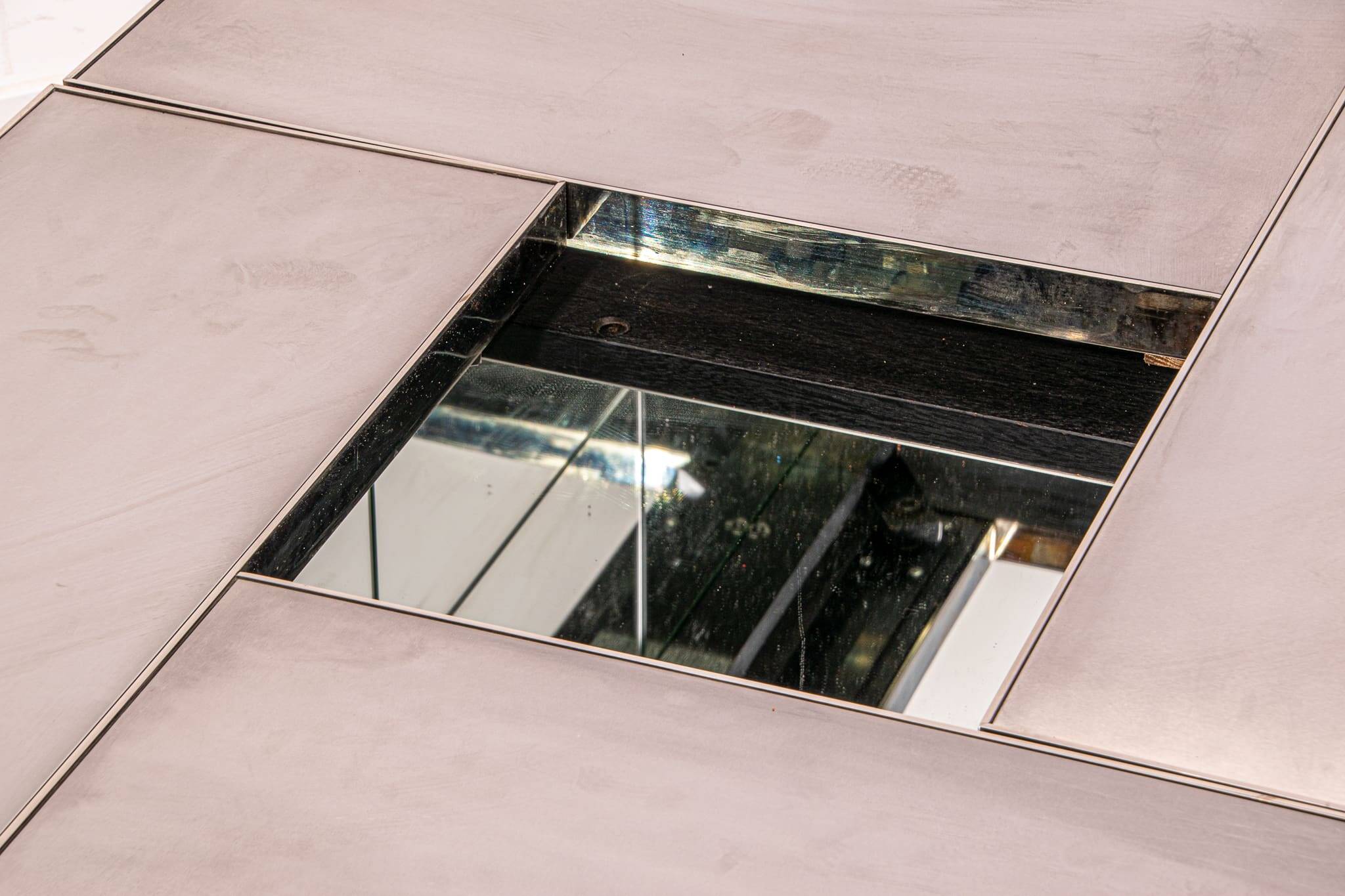 Table basse Belgo en métal brossé chromé