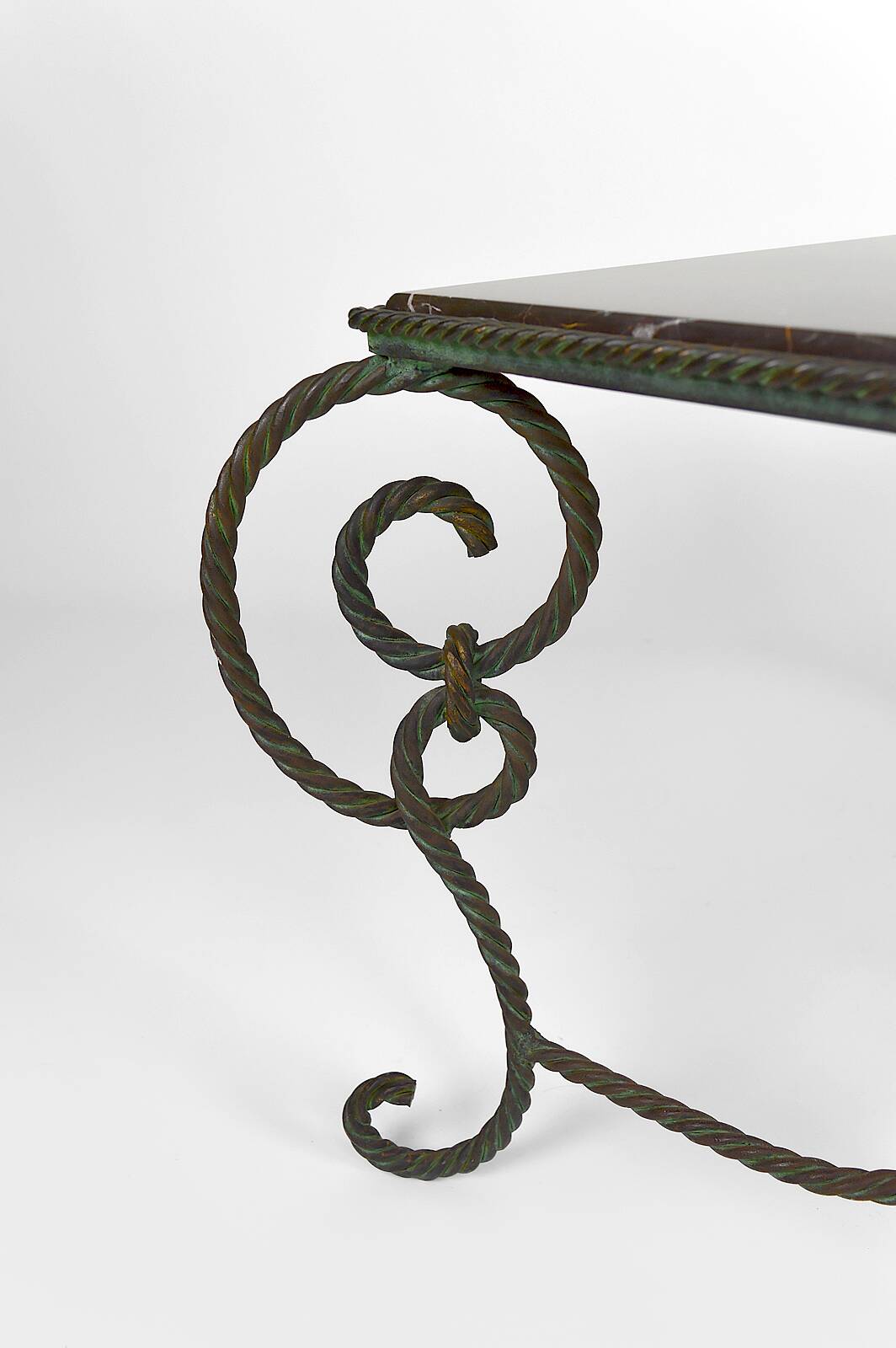 Coffee table in patinated wrought iron and black marble, circa 1940