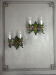 Pair of floral wall sconces in polychrome metal, circa 1900