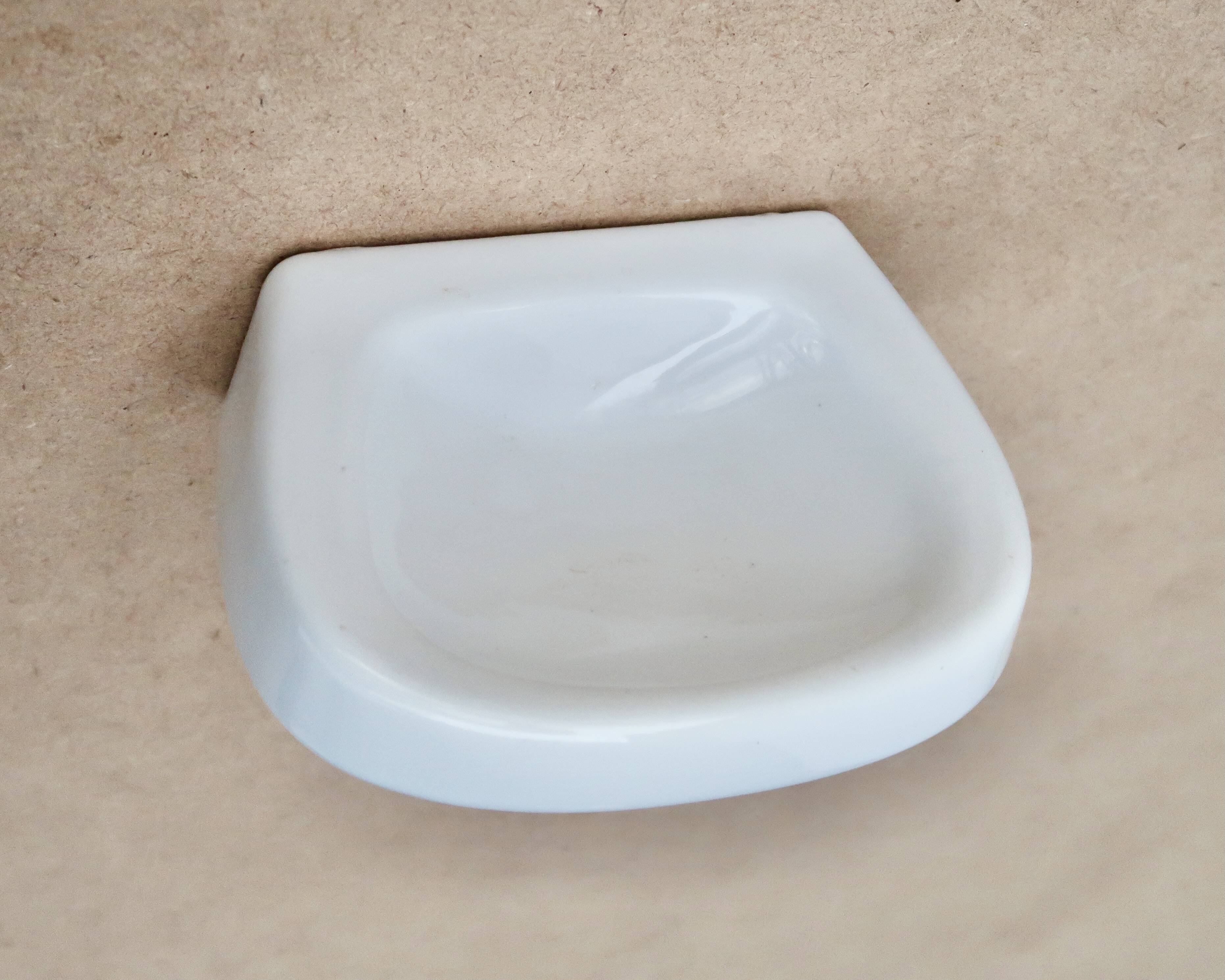 White wall-mounted soap dish in porcelain, 1950s.