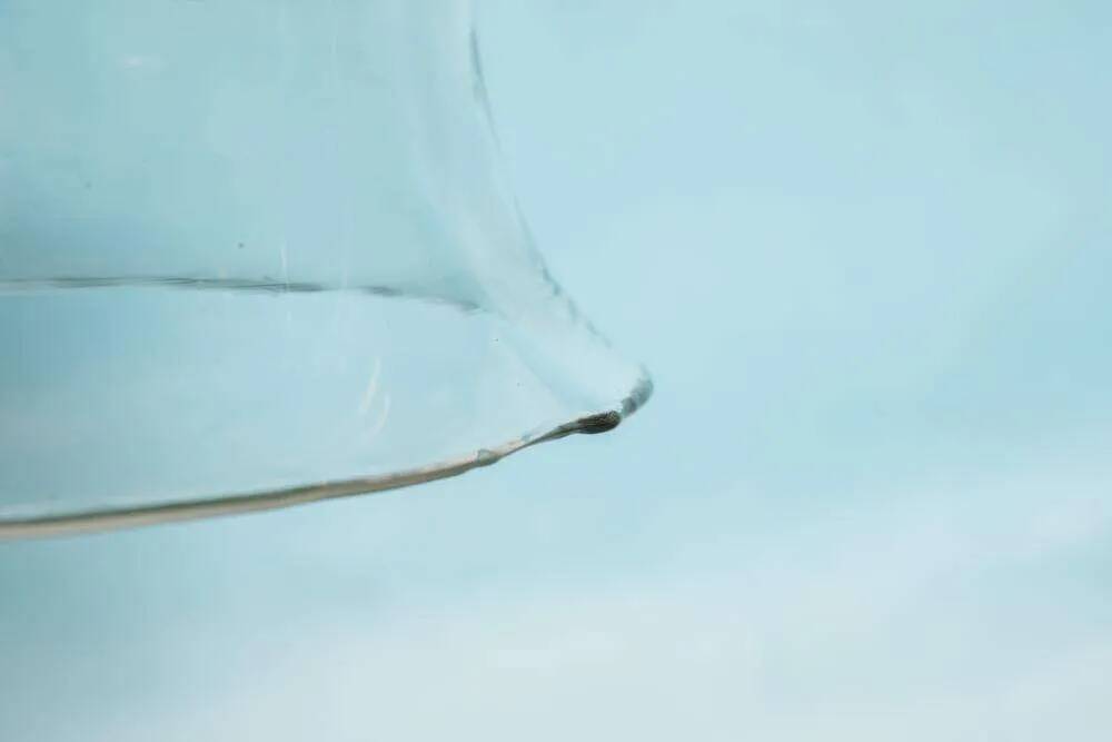 Minimalist glass pendant light Peil & Putzler from the space age