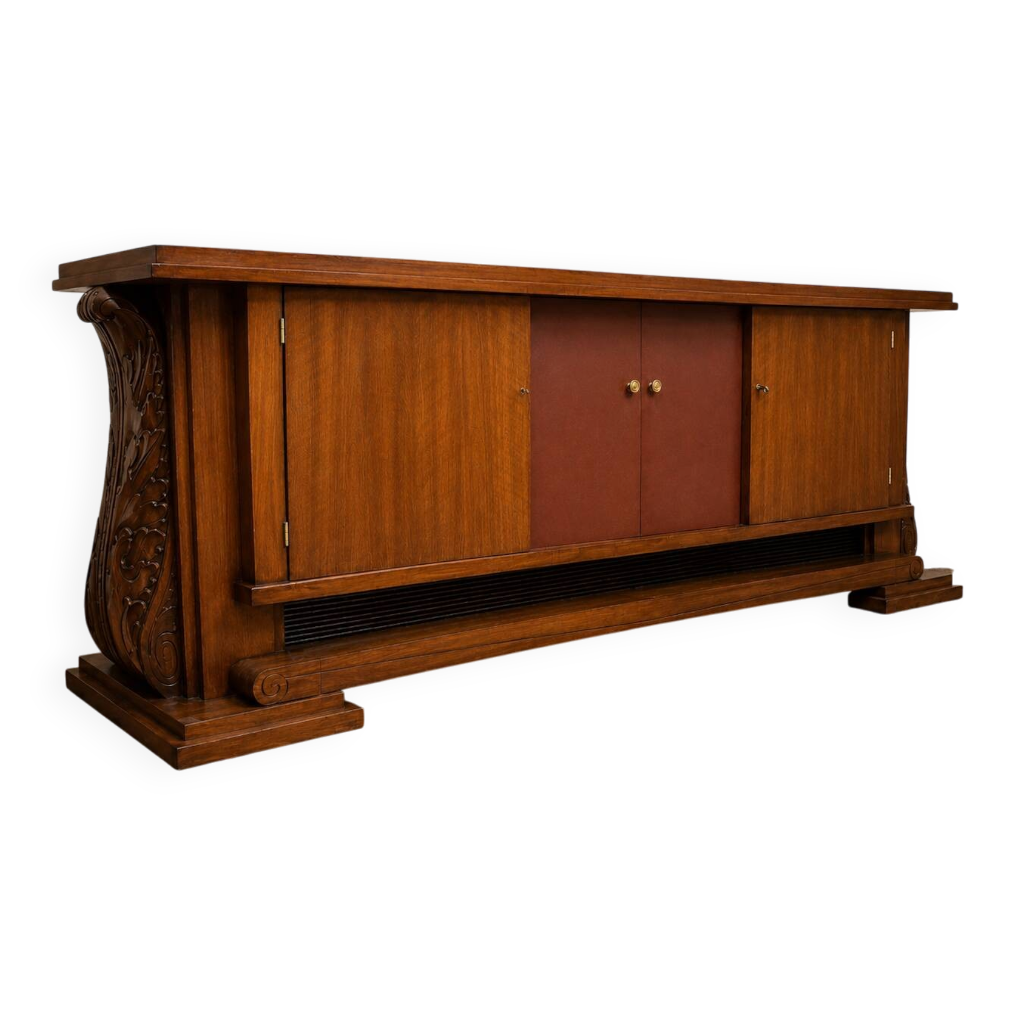 Important Art Deco sideboard in walnut and leather.