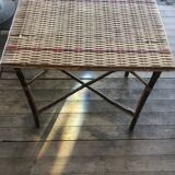 Rattan table with a red 50s