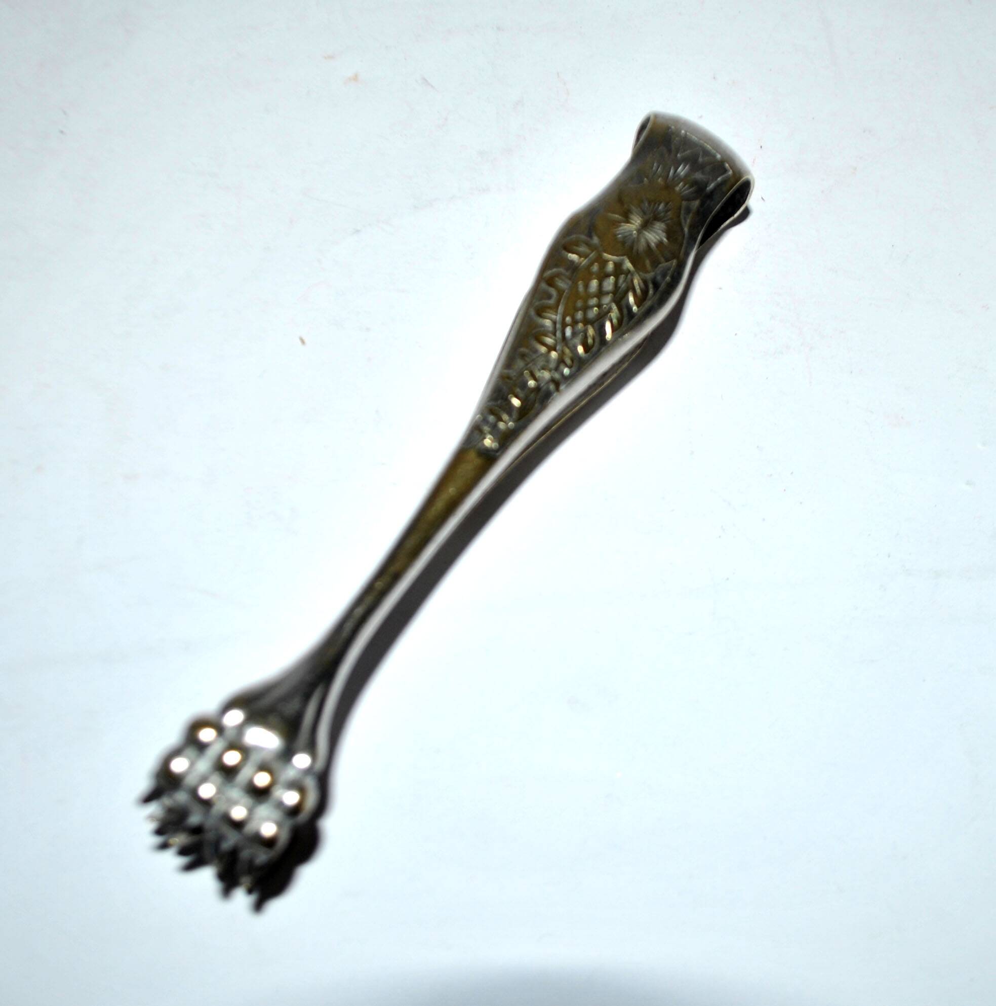 Pince à sucre en métal argenté vintage