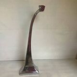 Large silver metal candlestick in the style of Xavier Lust
