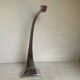 Large silver metal candlestick in the style of Xavier Lust