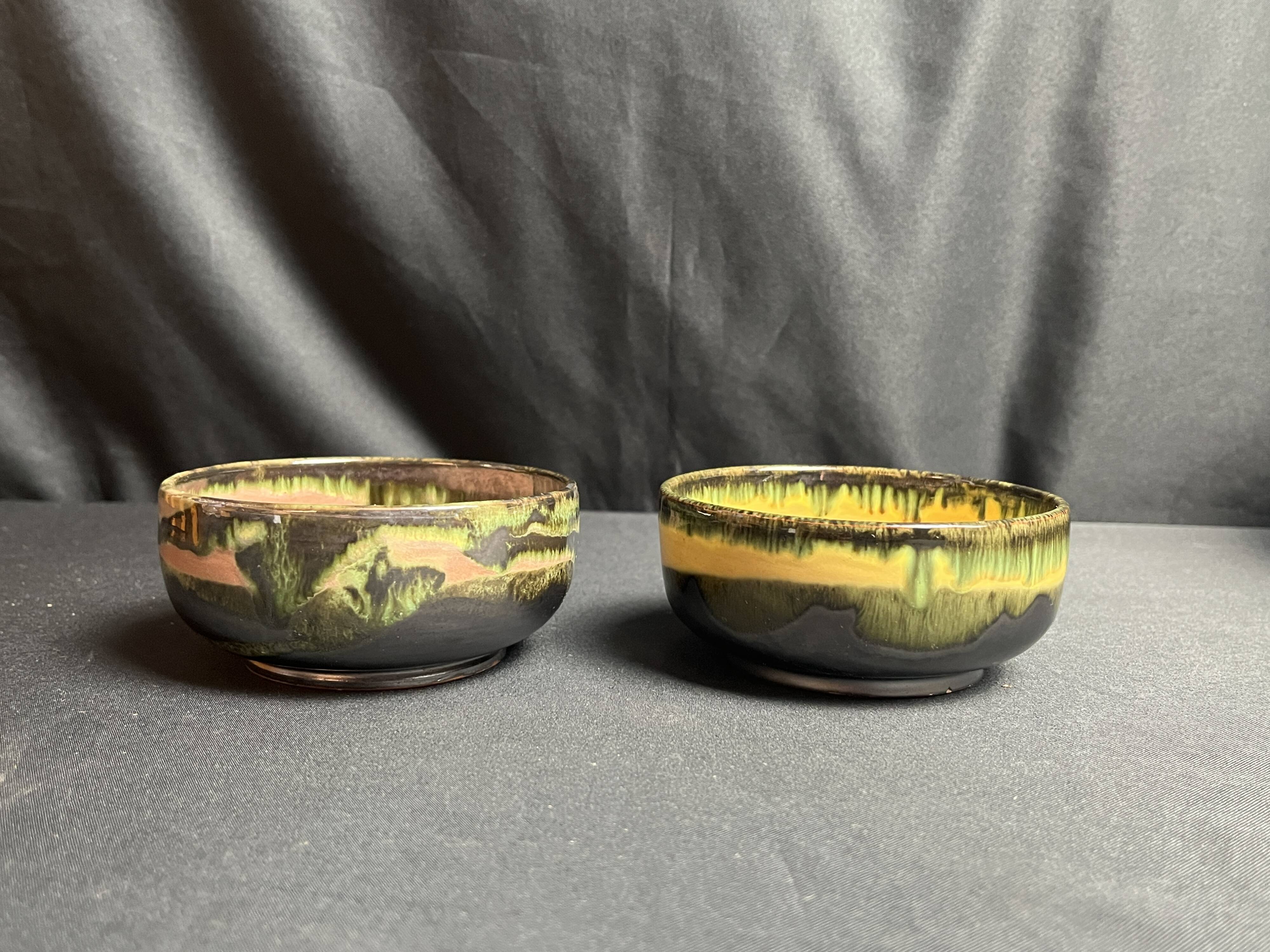Vintage, two flamed stoneware bowls from the 20th century.