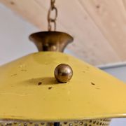 Suspension in perforated sheet metal