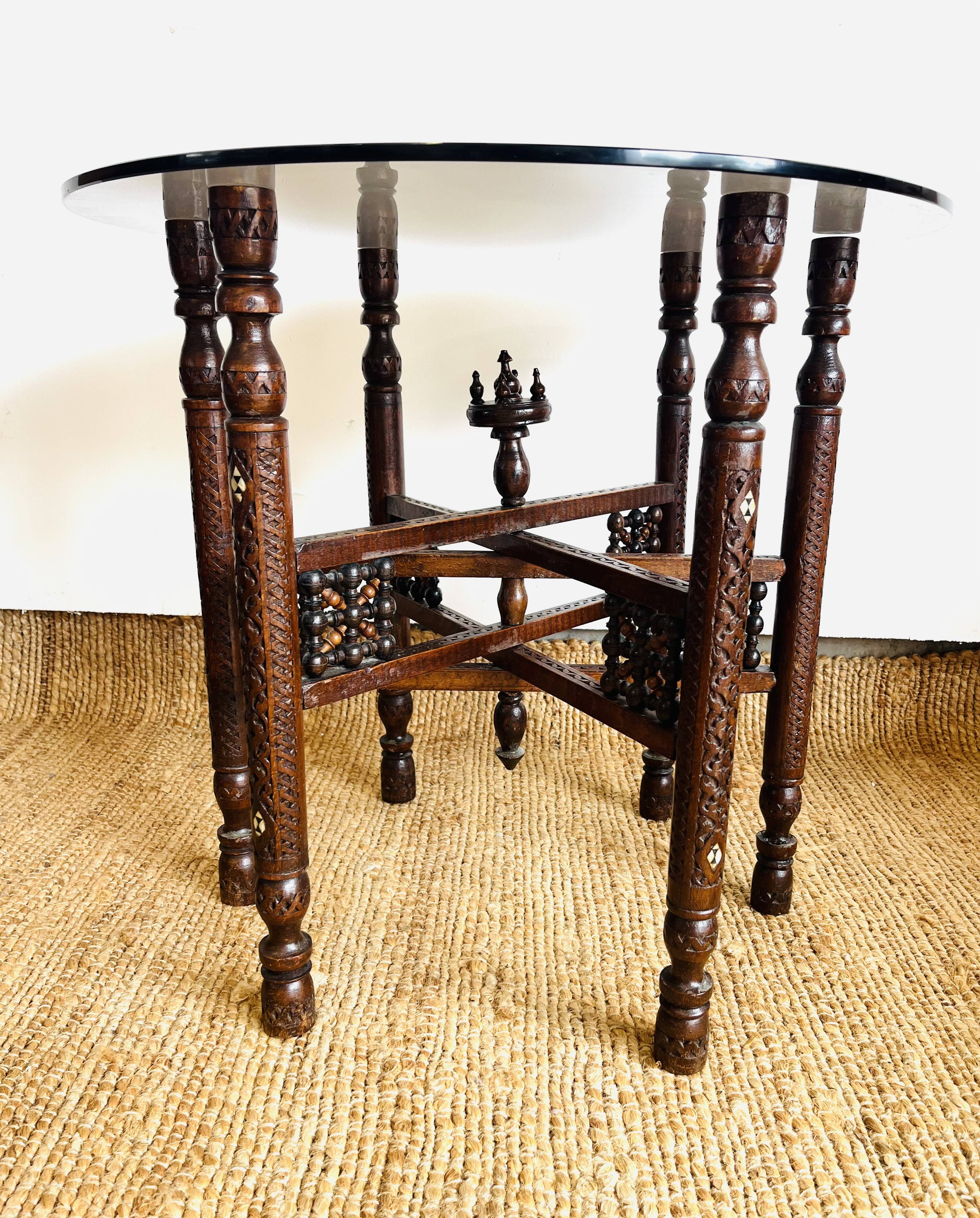 Moroccan hexagonal carved wood side table with glass top