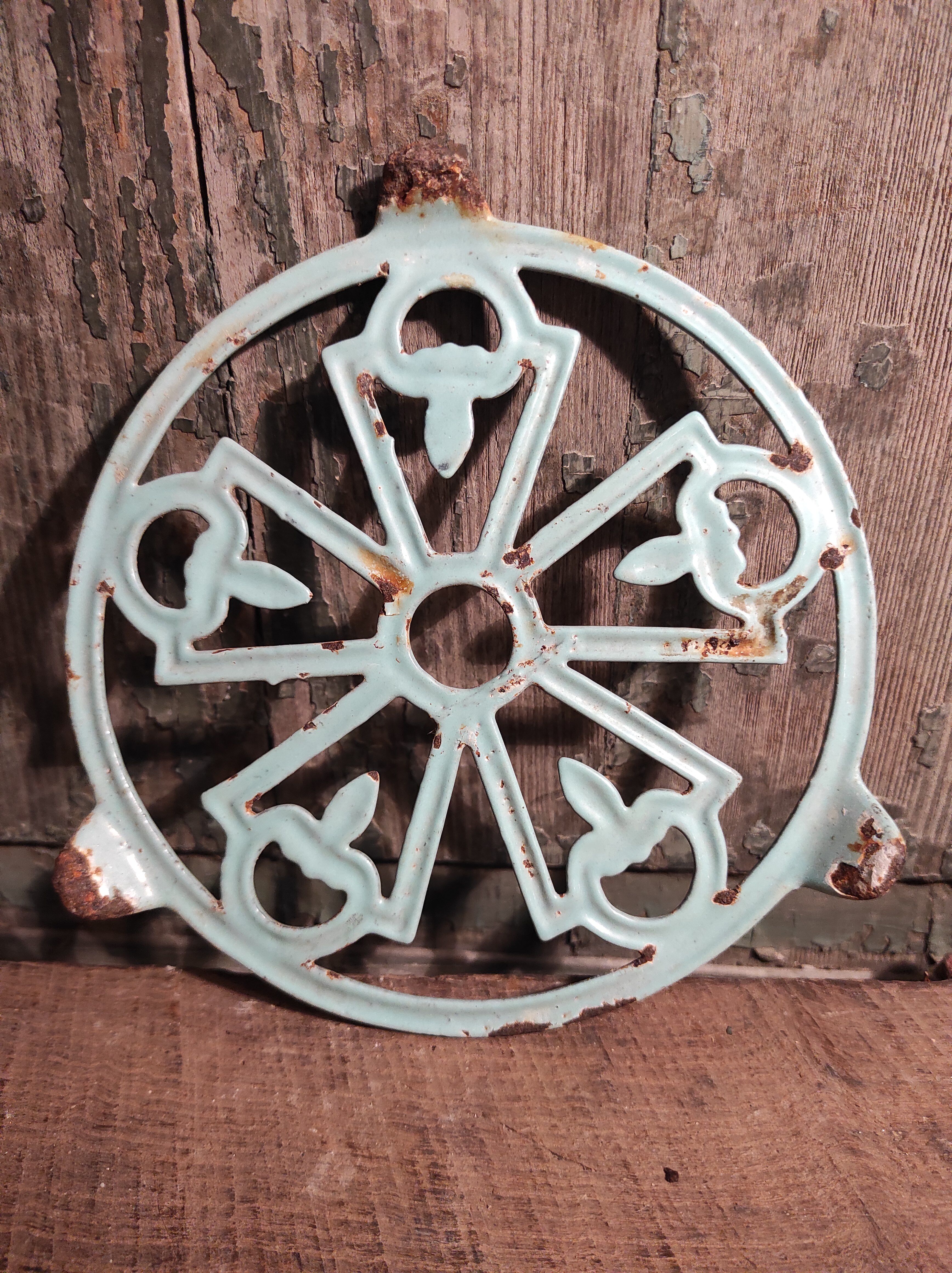 Vintage French light greenish blue cast iron table mat