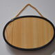 Butterflies in a bulging oval frame in vintage glass