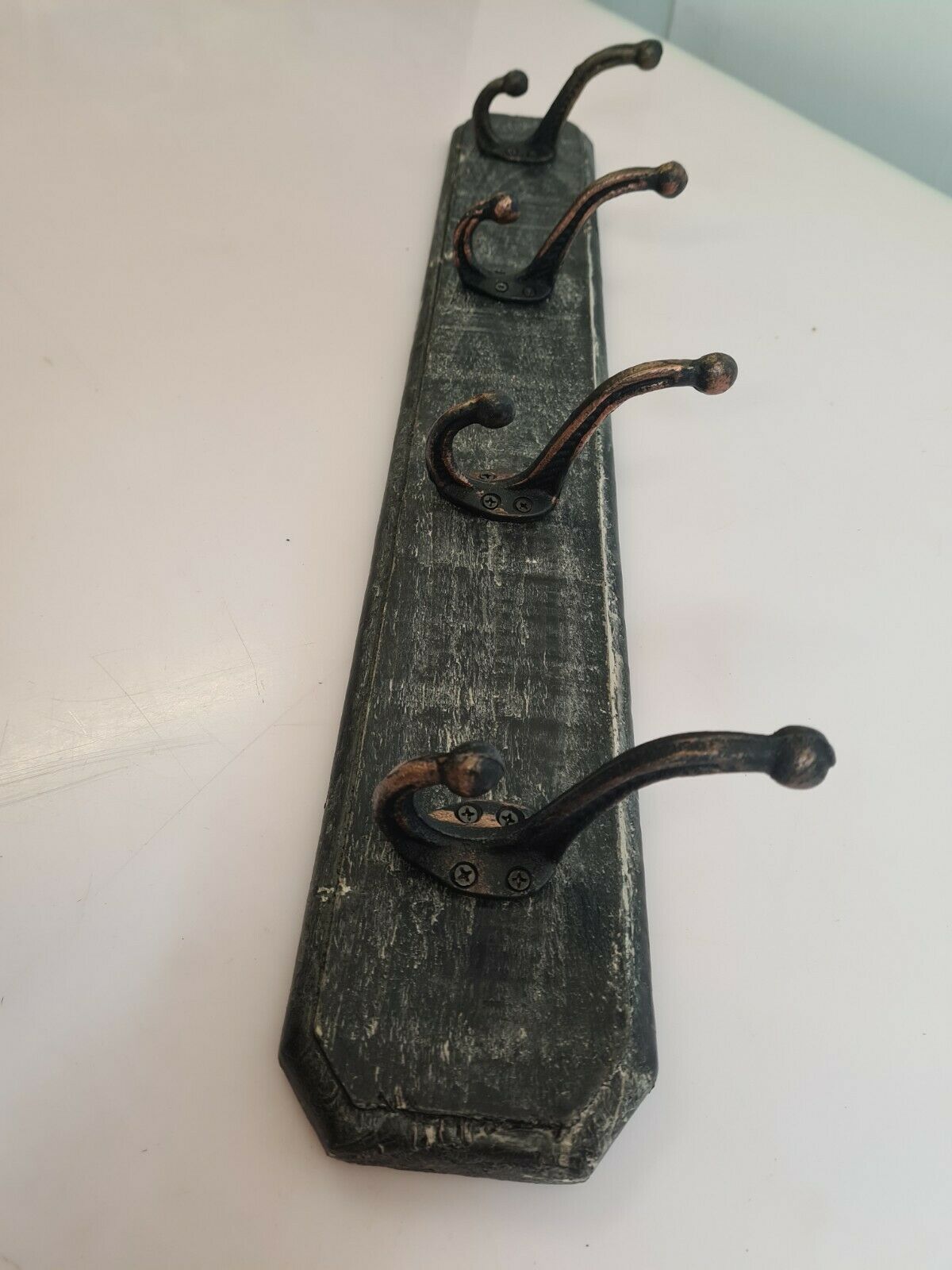 Coat rack in patinated wood and cast iron hooks