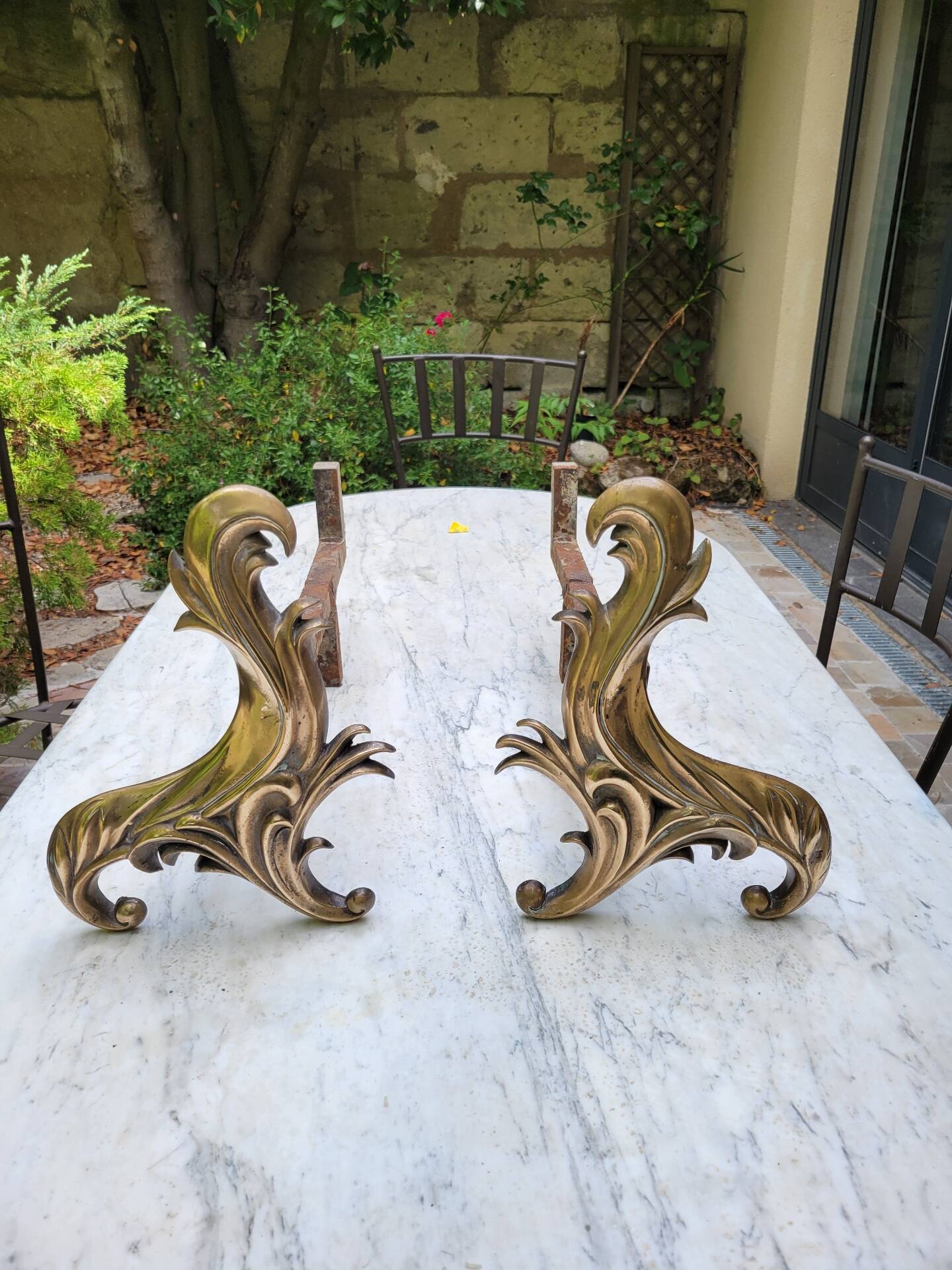 Gilded bronze chenets from the 19th century