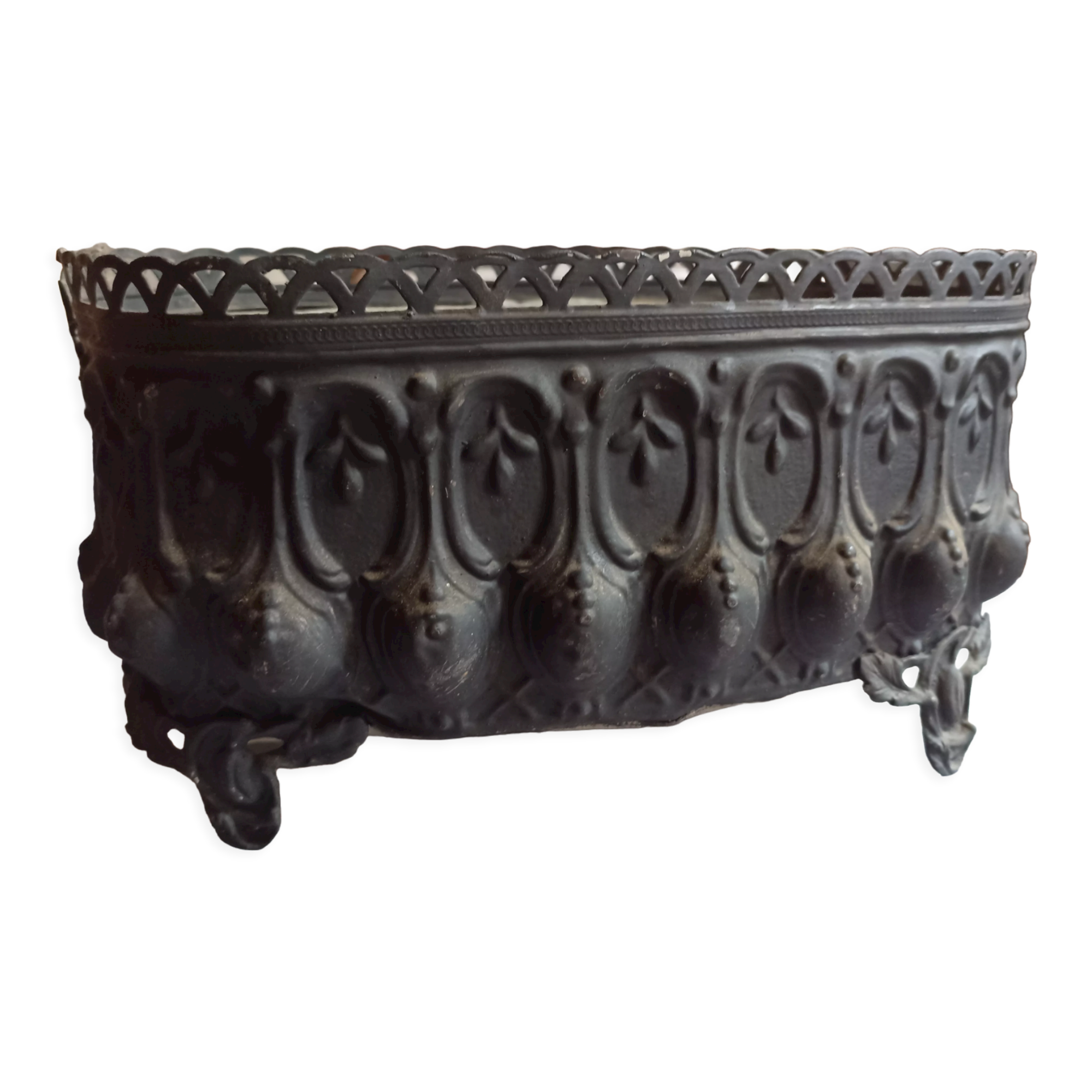 Old black iron planter
