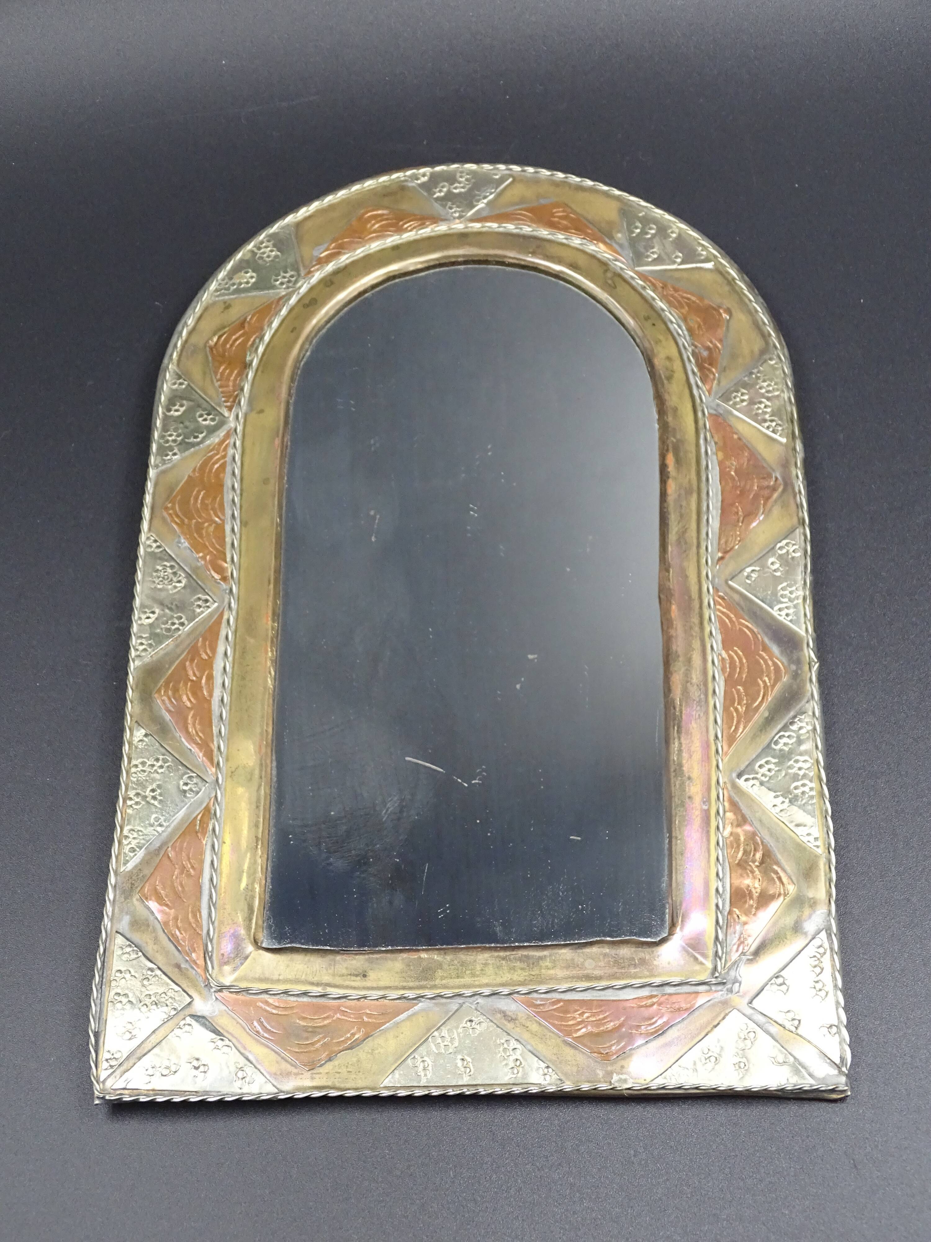 Oriental mirror in worked copper 24x15cm