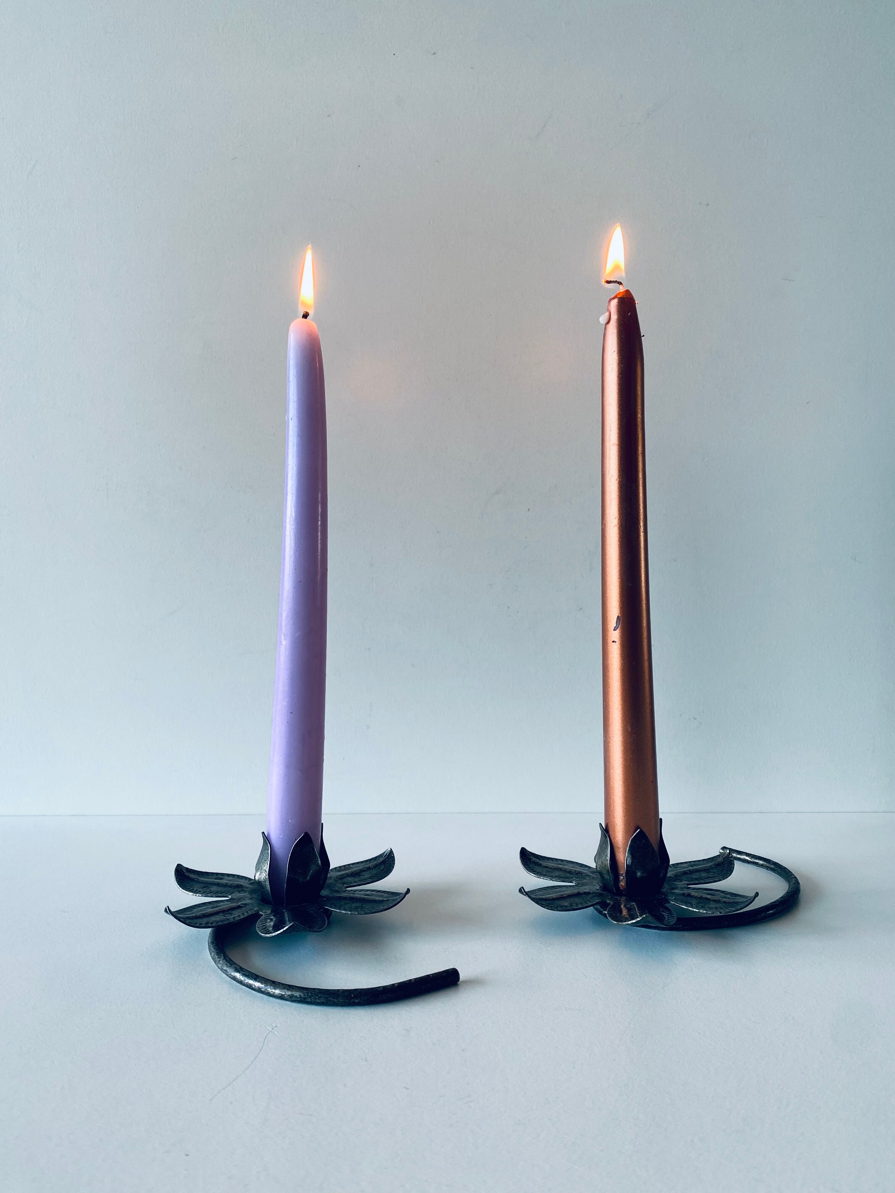 Pair of iron water lily candle holders