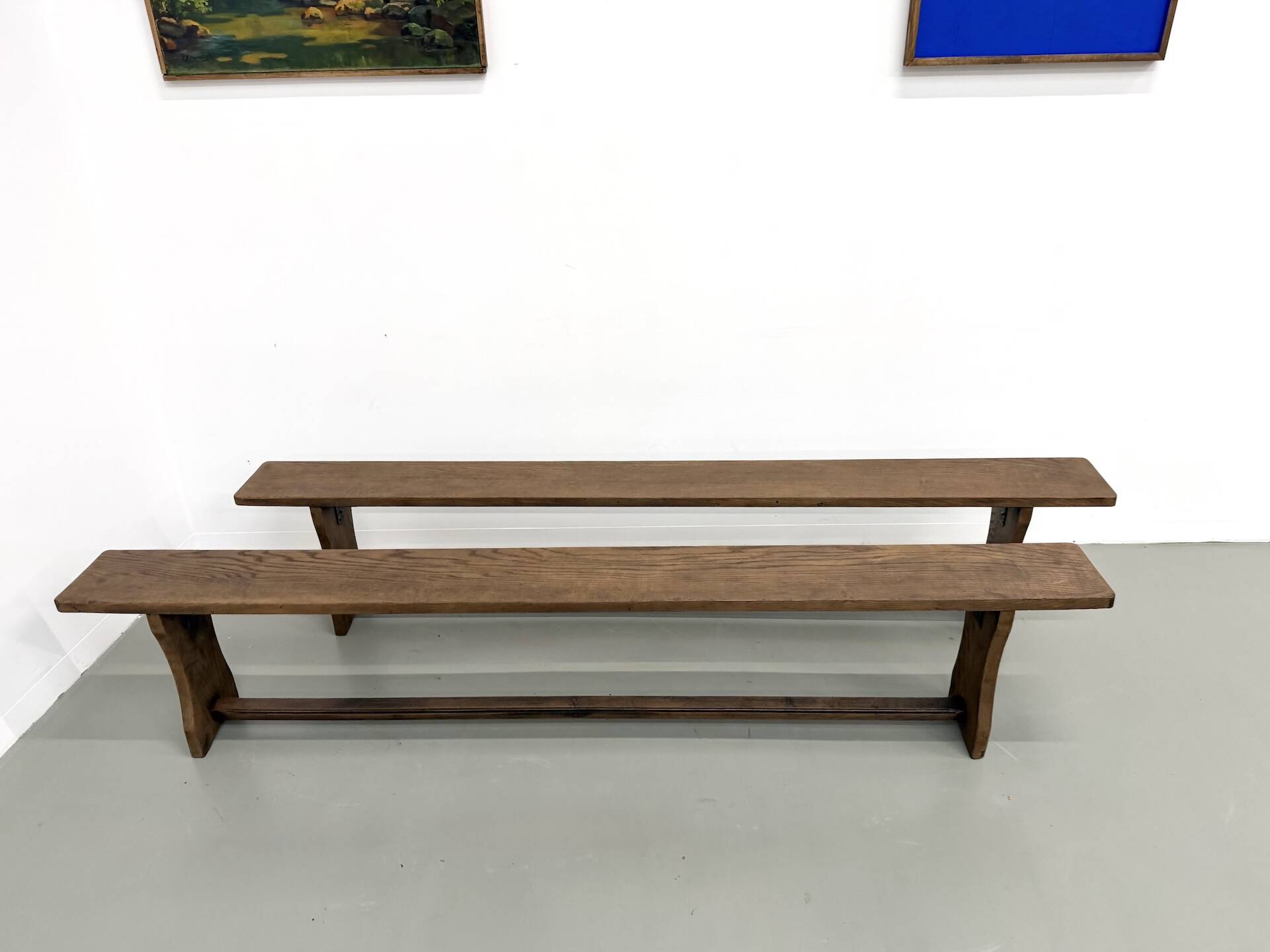 Pair of solid oak benches, winged legs, France, 1970s