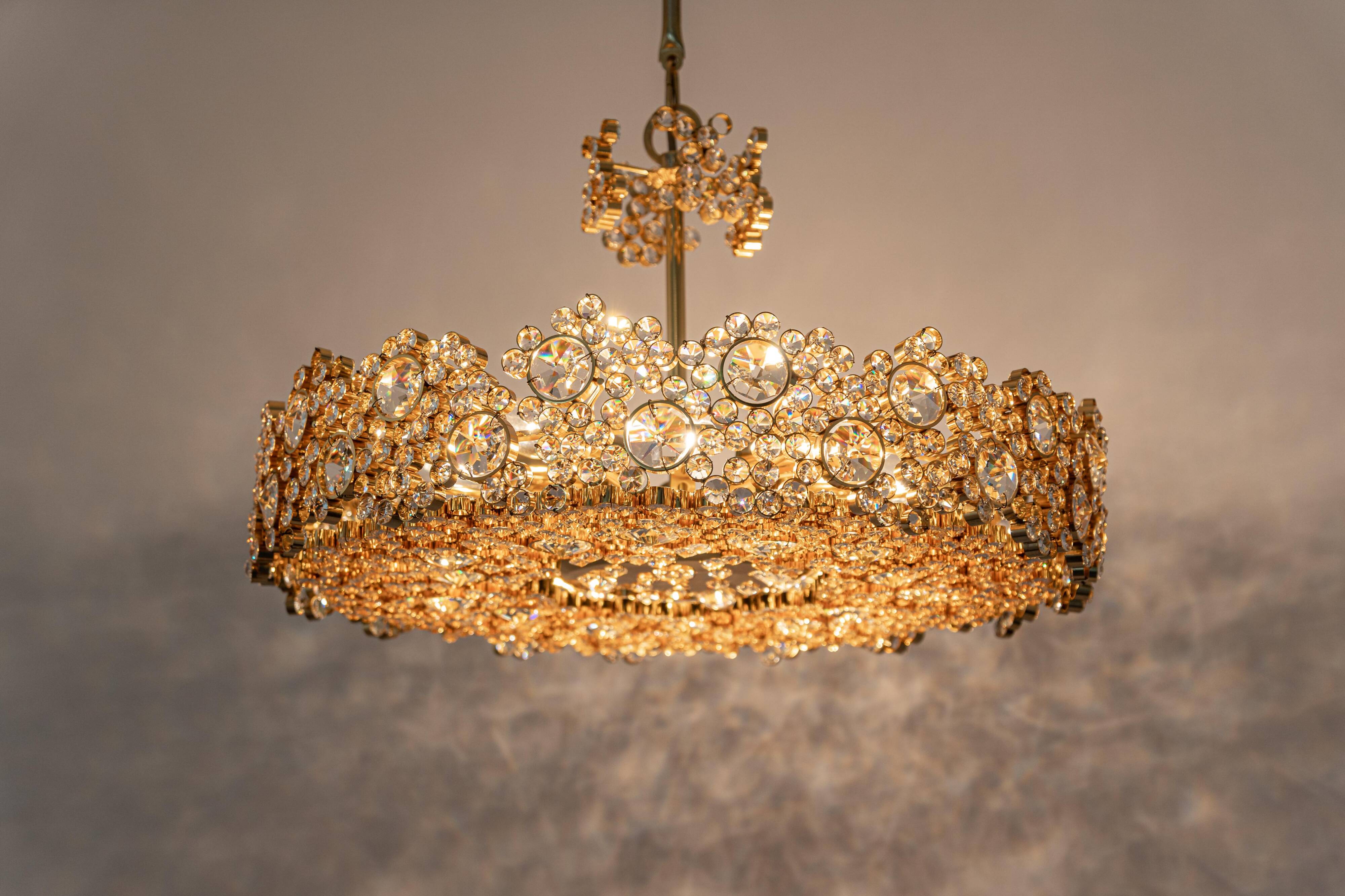 Chandelier in gilded brass and crystal glass inlaid by Palwa, Germany, 1970s.