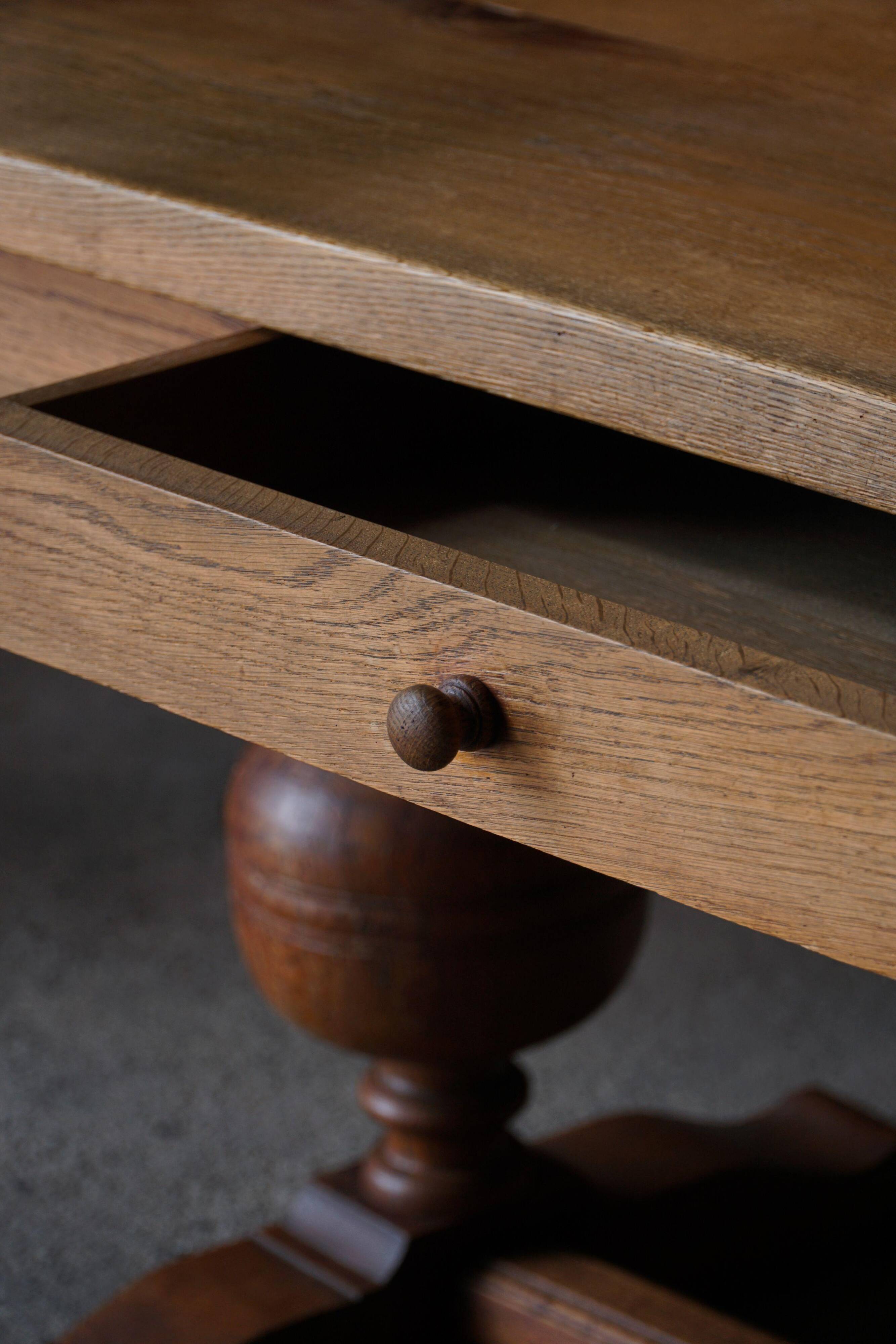 Baroque writing desk from the 1920s in solid oak, by a Danish cabinetmaker.