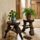 Pair of tripod stools with vine legs, oak top.