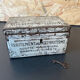 Old metal and wood medicine box with key